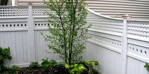 Good Neighbor Cedar Privacy Fencing with lattice by Elyria Fence